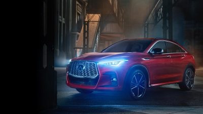 Front and side profile of a red luxurious INFINITI QX55