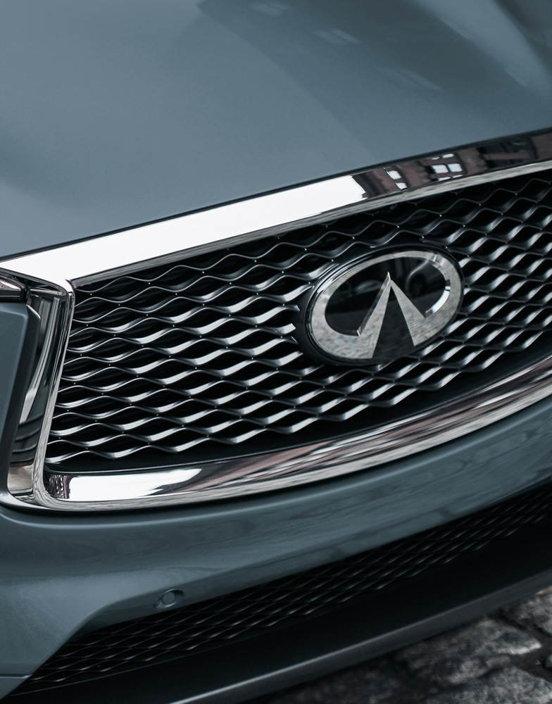 2024 INFINITI QX50 small SUV signature double-arch grille