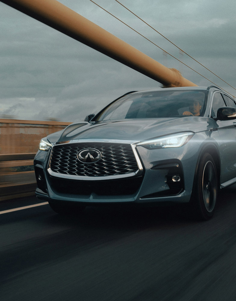 A grey 2024 INFINITI QX55 crossover double-arch grille