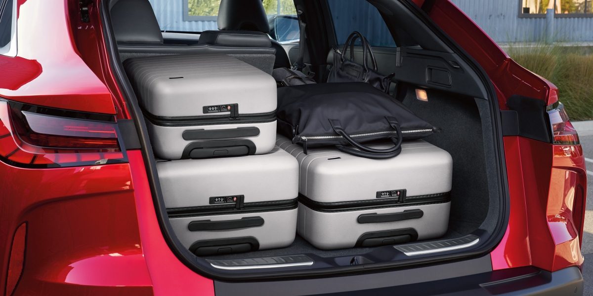 2024 INFINITI QX55 crossover cargo space with suitcases