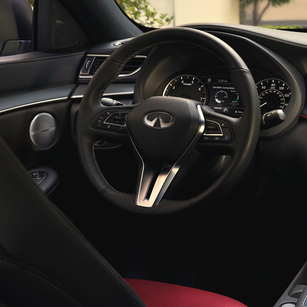 Steering wheel of 2025 INFINITI QX50 with lane departure assist and vibrational feedback system