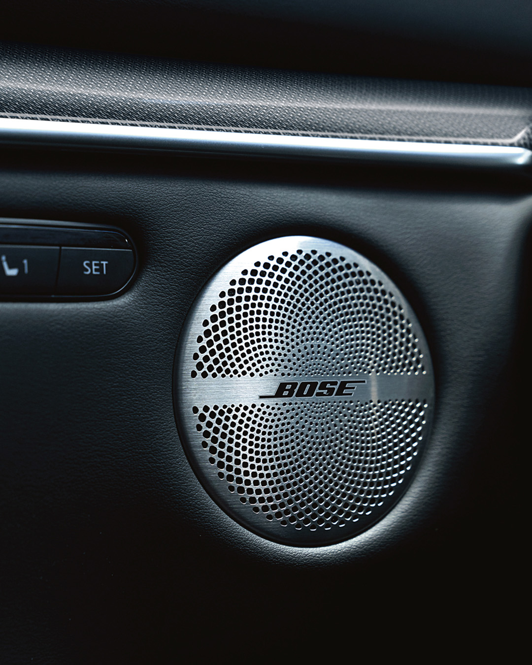 Closeup of INFINITI QX50 Bose speaker