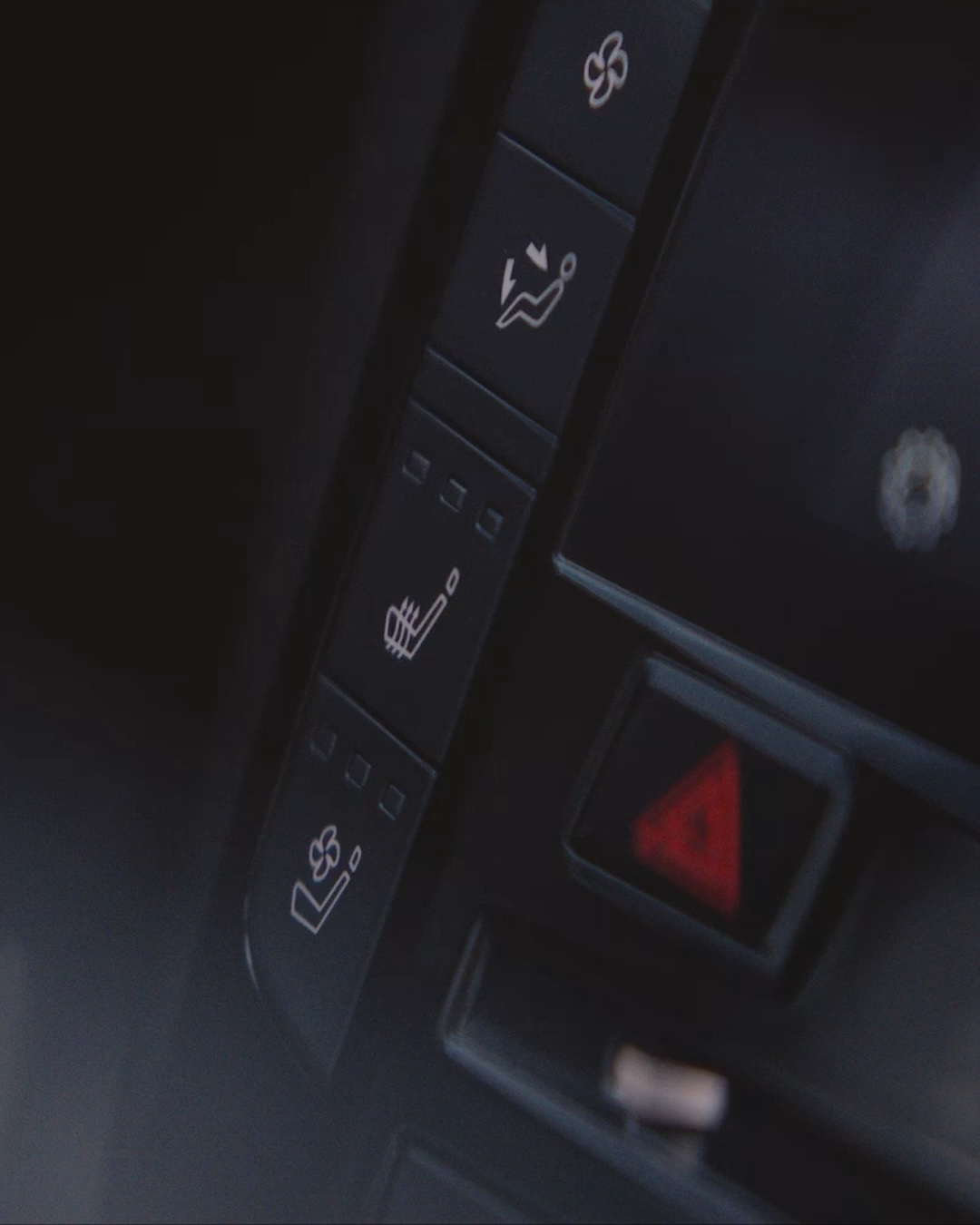 Interior controls showing heated seat options in the QX55 cabin