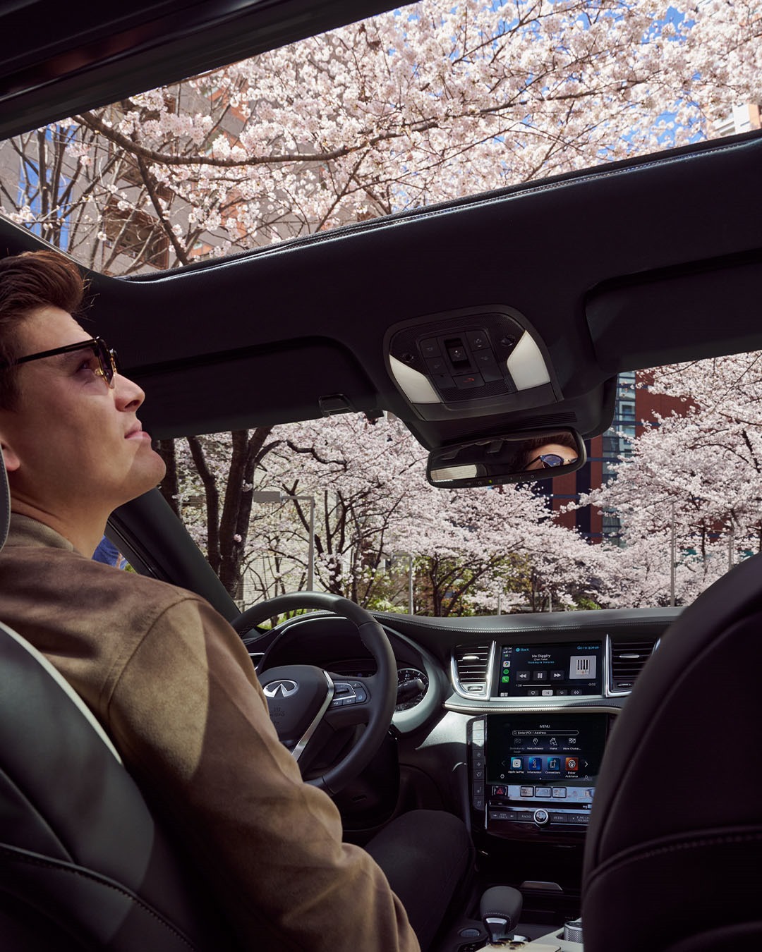 Panoramic view from inside the QX55 showing natural light through the moonroof