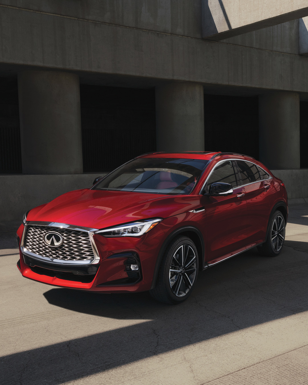 Front view of QX55 showcasing sport-style grille and angular fog lights