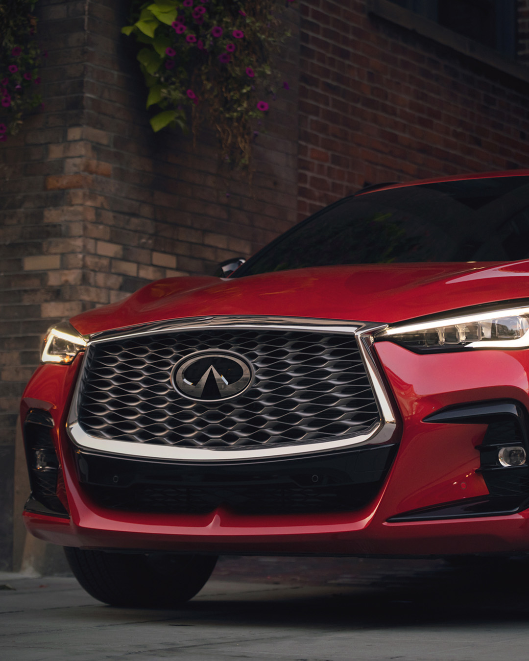 Closeup of QX55 signature double-arch grille