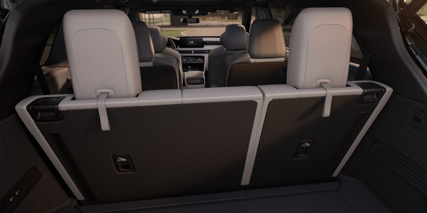 Split view of QX60 rear cargo area with seats upright