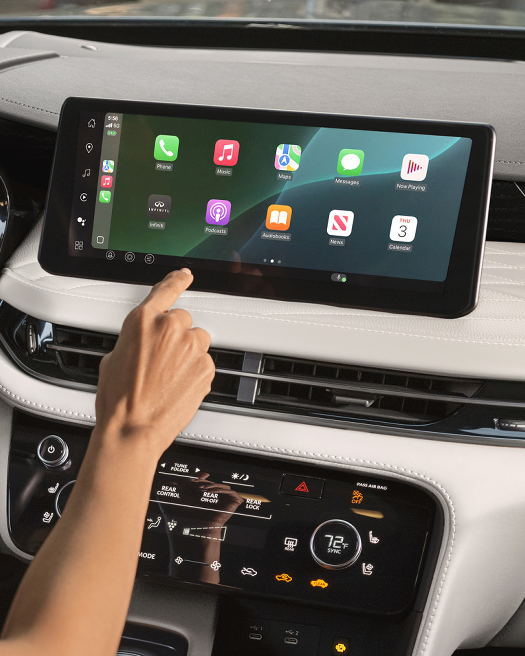 Interior showing dual 12.3-inch InTouch screens with Apple CarPlay on main display
