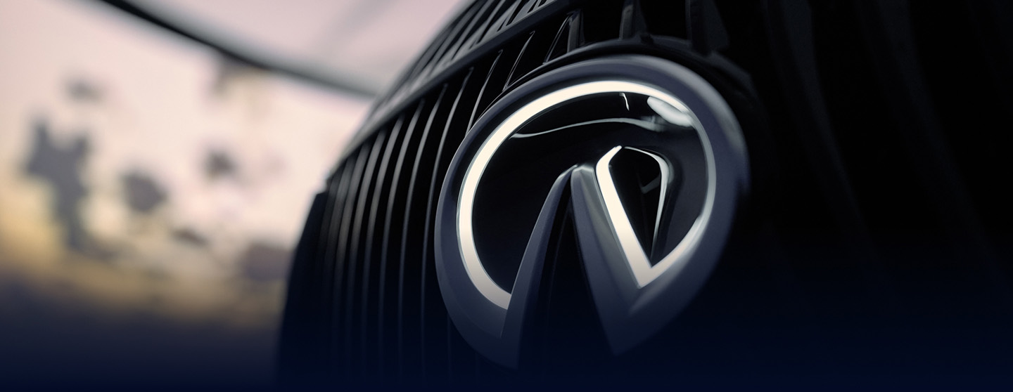 2026 INFINITI QX80 closeup of INFINITI emblem