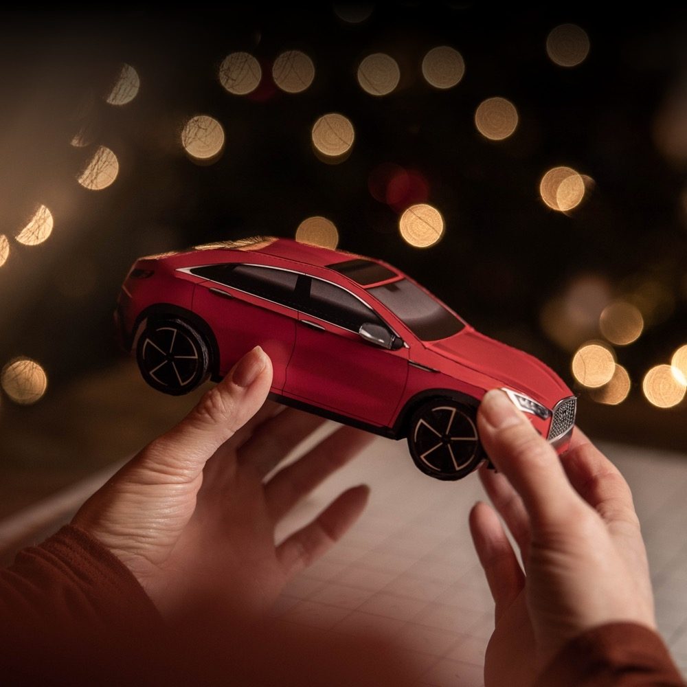 Close-up view of a 2023 INFINITI brown leather seat stitching