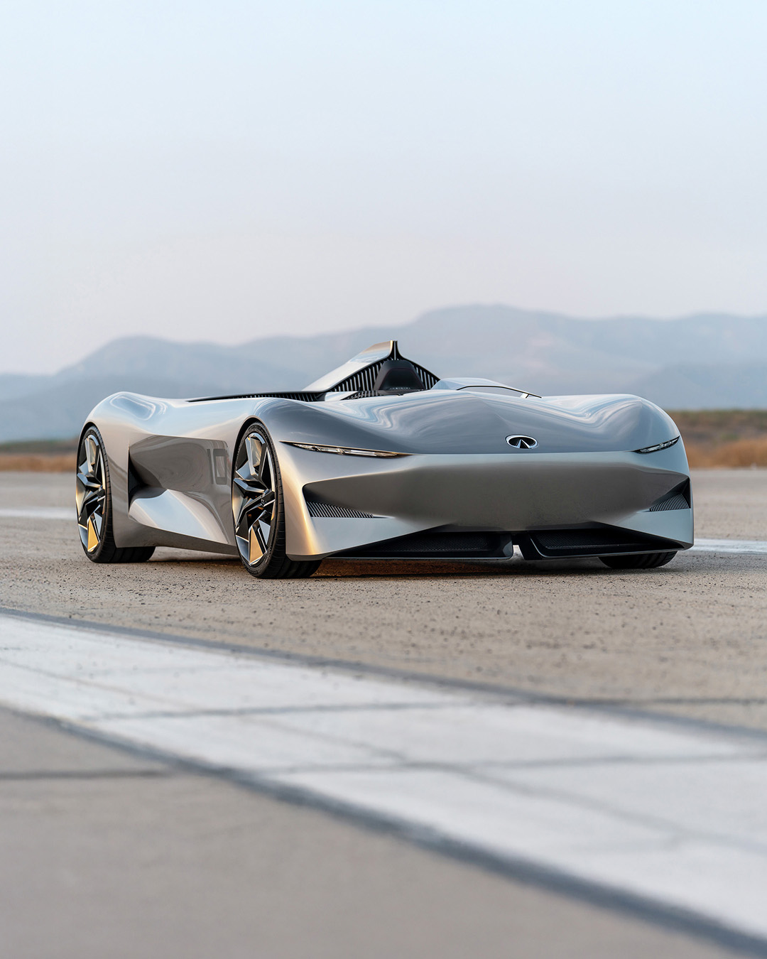 INFINITI prototype 10 parked in front of mountain view