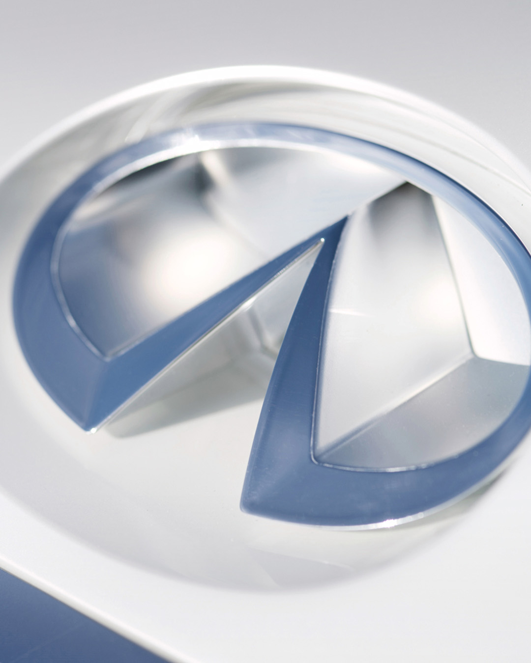 Closeup of INFINITI logo symbol