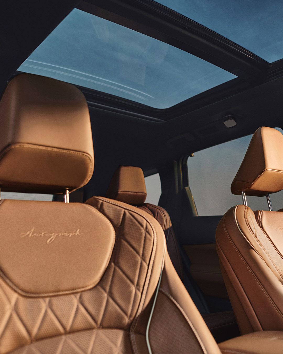 Boy looking out of INFINITI car window