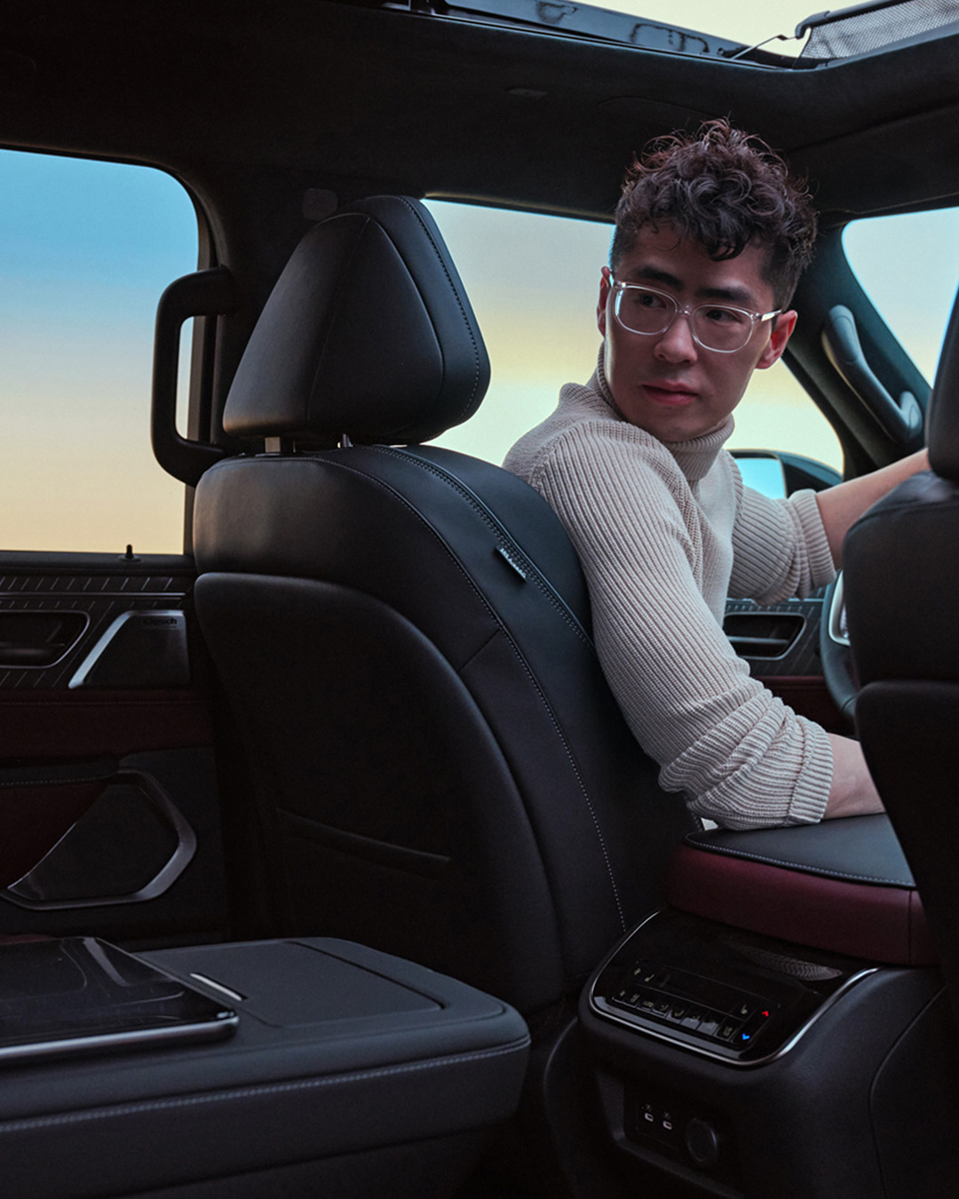 Interior view of INFINITI car driver looking back 