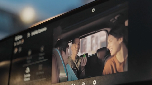 In-car camera display capturing passengers enjoying their journey in an INFINITI car