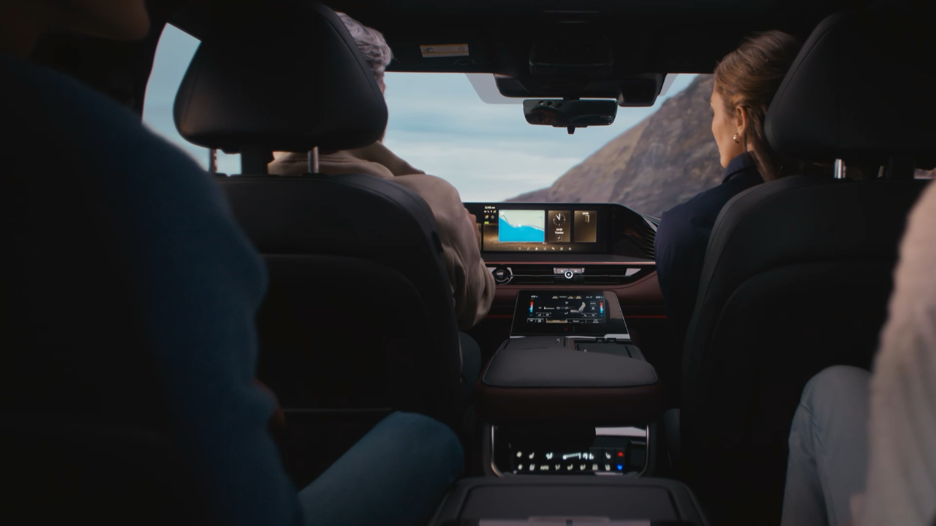 Interior view of an INFINITI car featuring INFINITI InTouch™ technology, integrating navigation and entertainment.