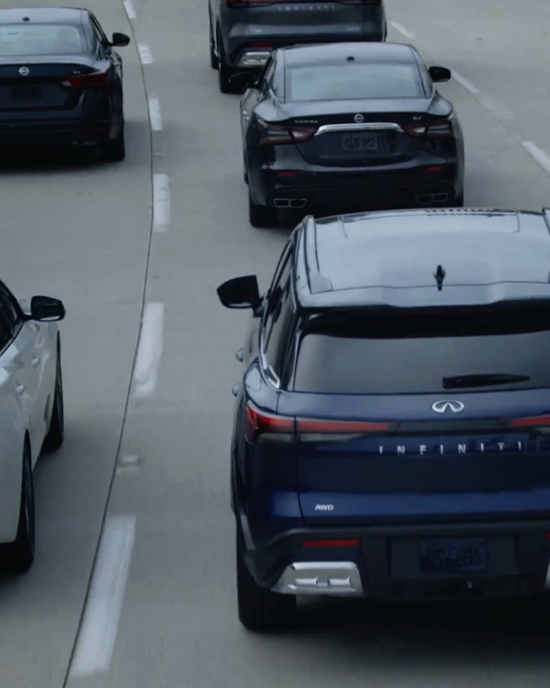 Video showcasing Lane Departure Prevention keeping an INFINITI car centered on the highway