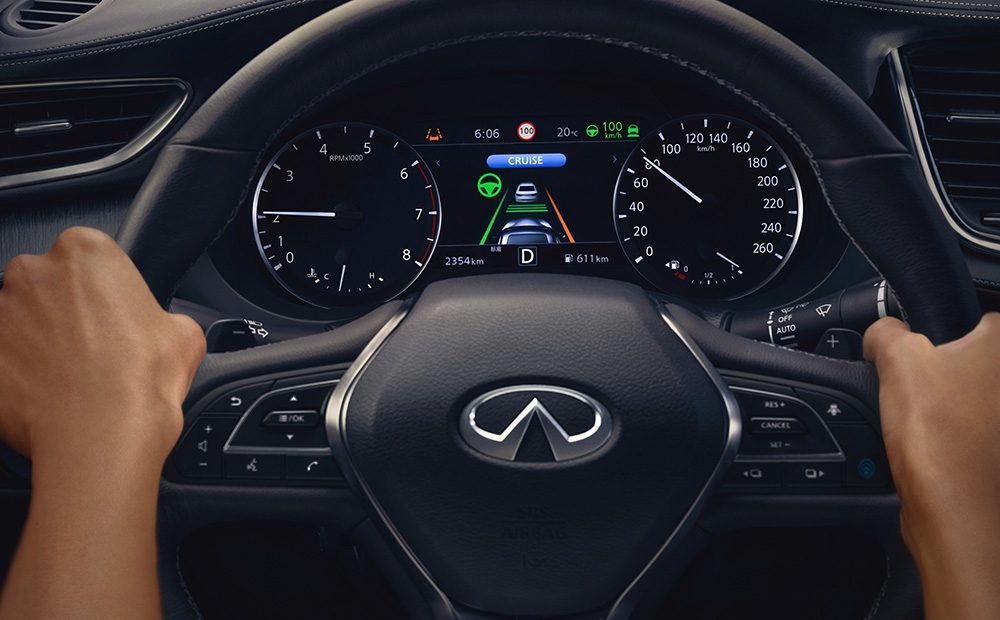 Lane Departure Prevention system in action, keeping an INFINITI car centered on the road