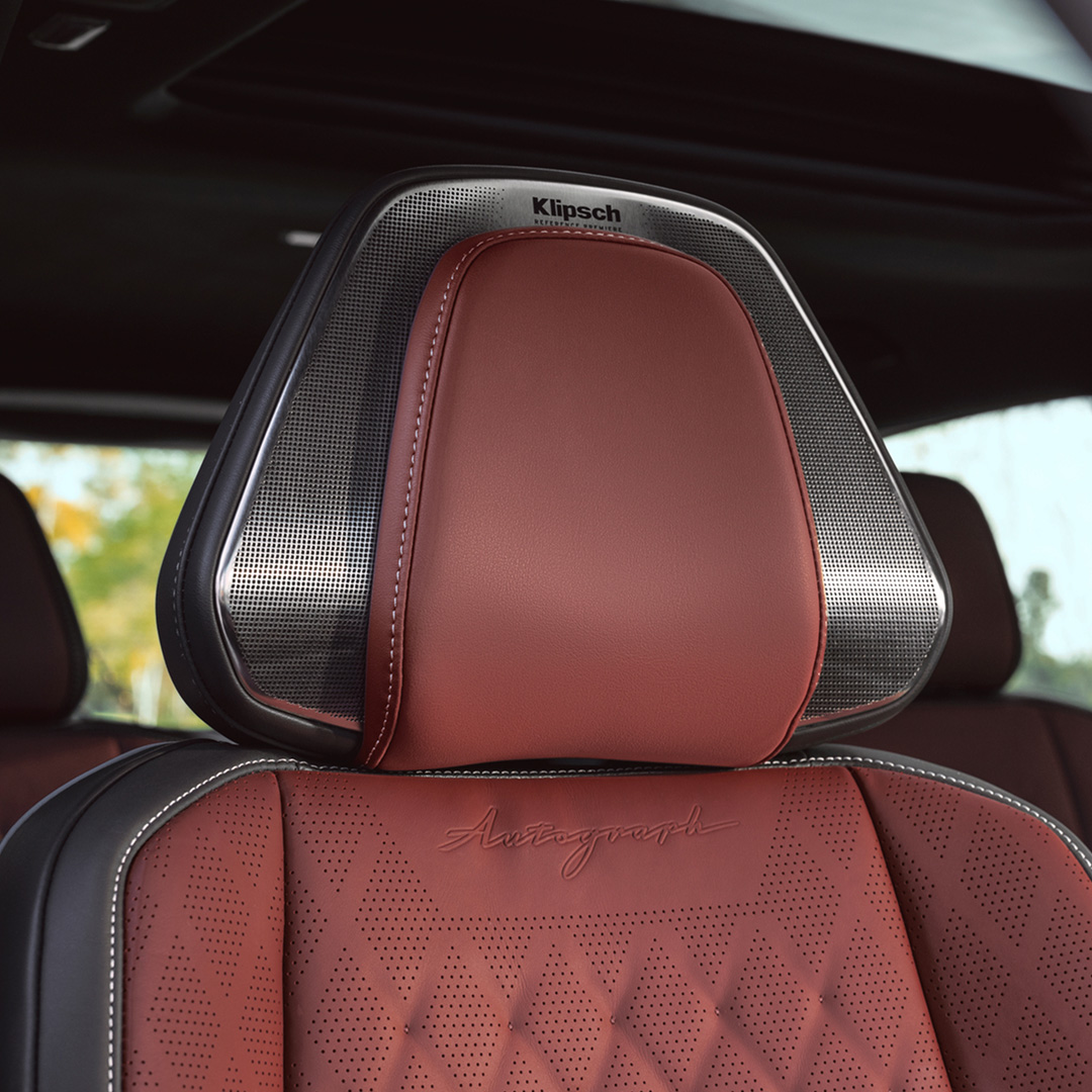 Close-up of a premium headrest in an INFINITI car, highlighting a unique partnership with luxurious design