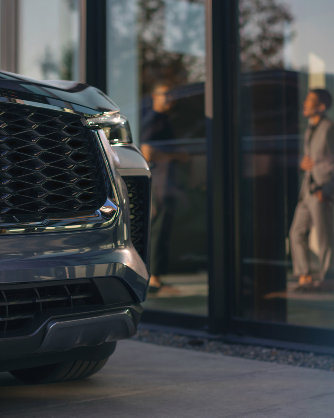 Corner of INFINITI car front grille