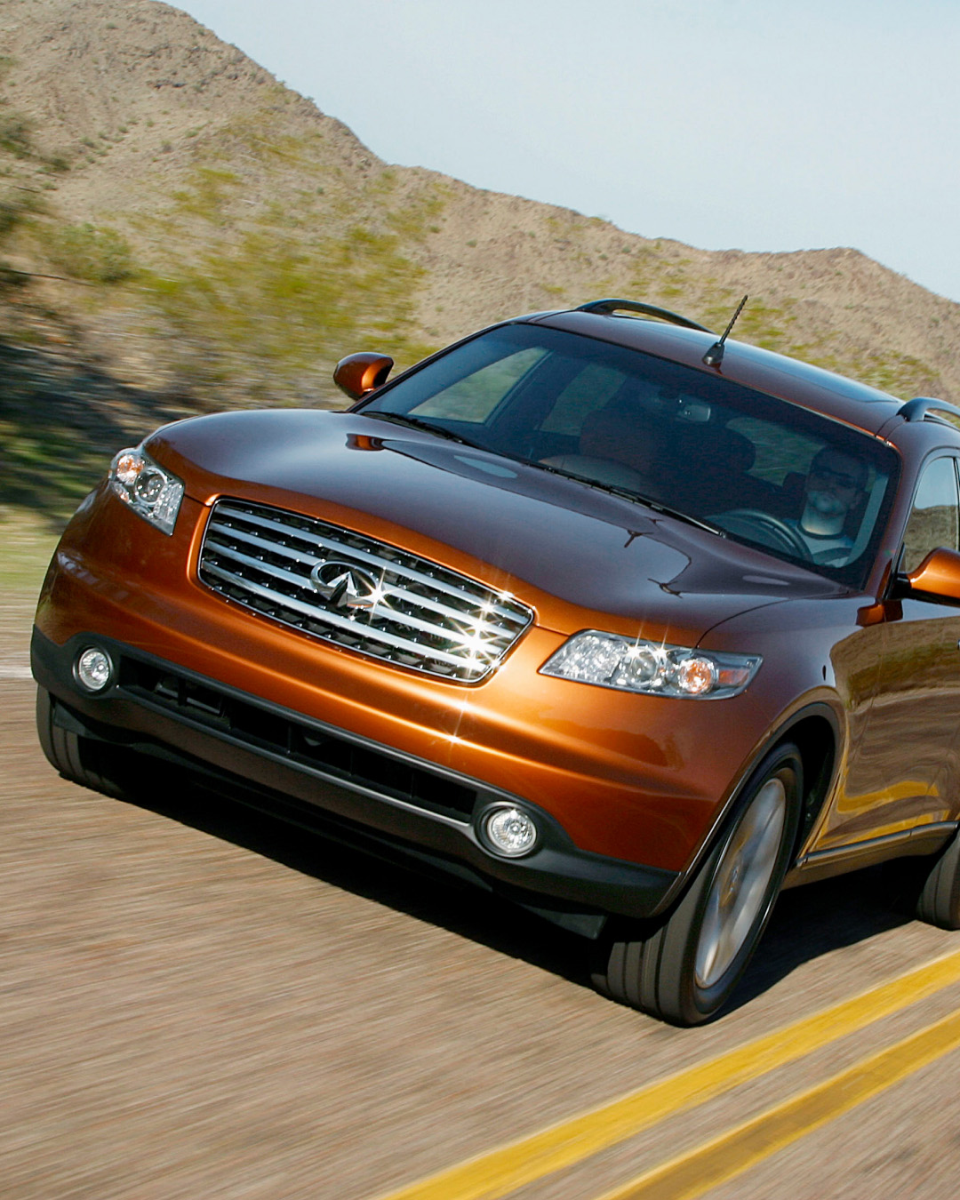 INFINITI FX35 luxury crossover coupe showcasing driver assist tech