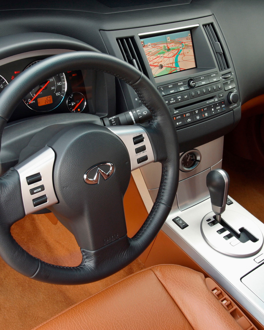 Interior view of INFINITI FX35 luxury crossover coupe steering wheel and dashboard