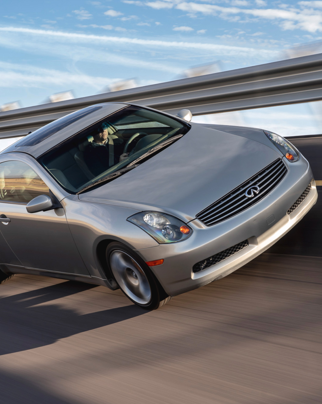 INFINITI G35 luxury sport coupe demonstrating 3.5L V6 engine