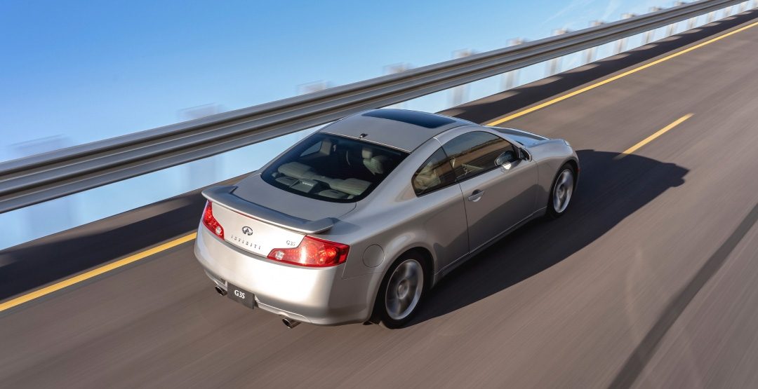 Overhead rear view of INFINITI G35 luxury sport coupe driving