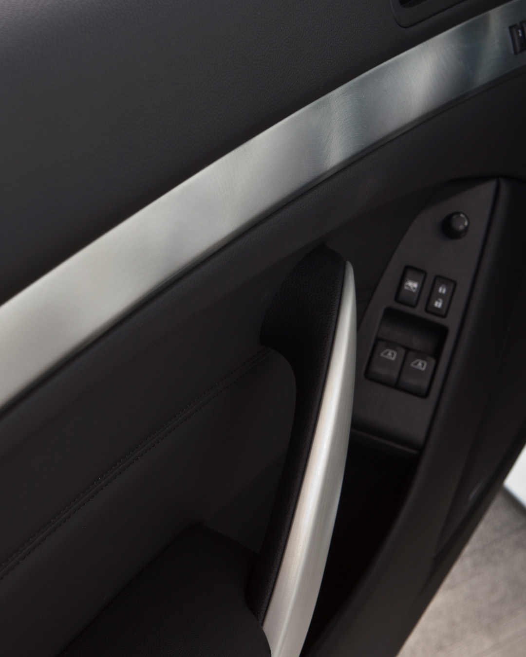 Closeup of INFINITI G37 luxury sport sedan aluminium trim