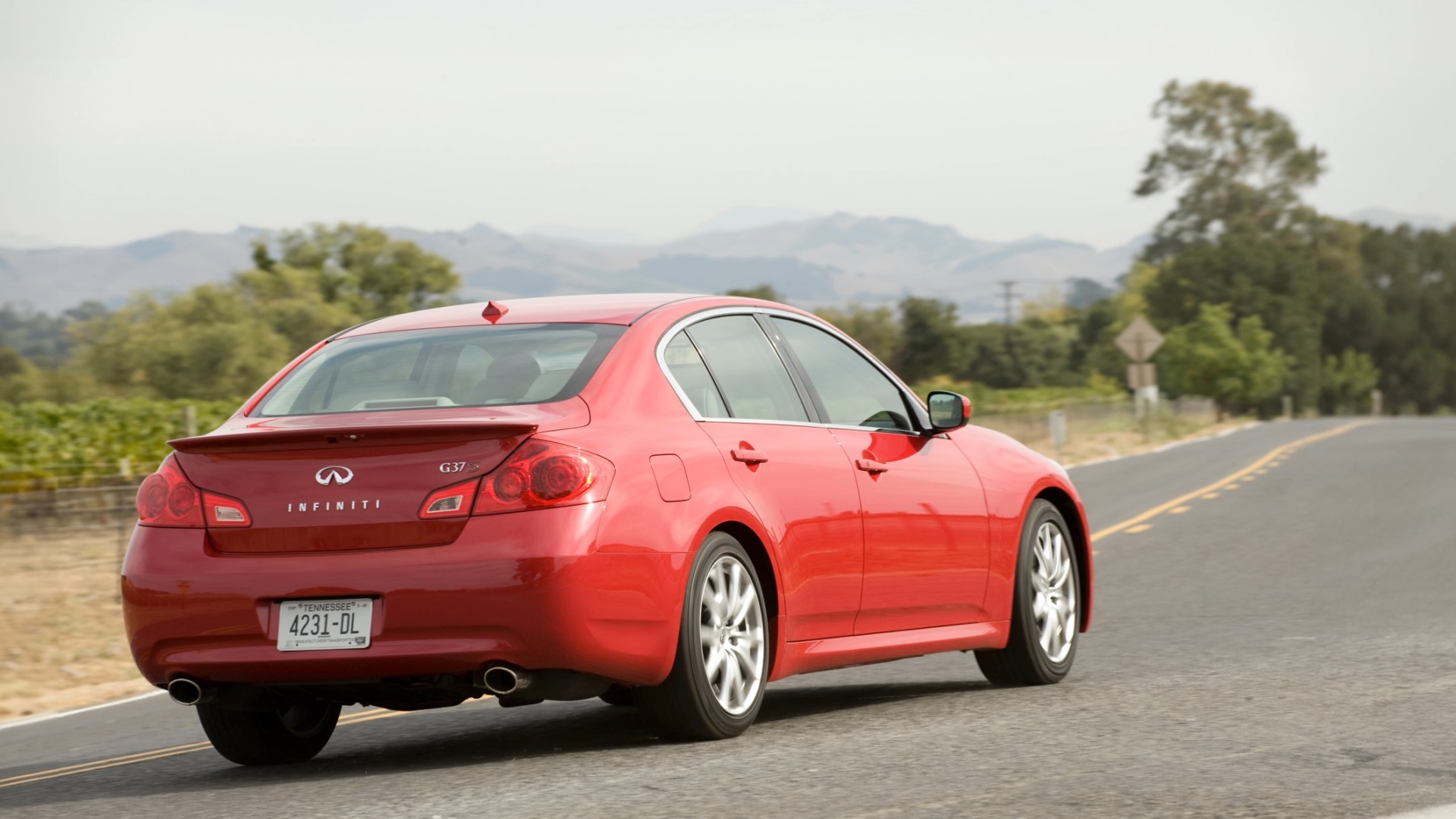 Rear view of INFINITI G37 luxury sport sedan in red