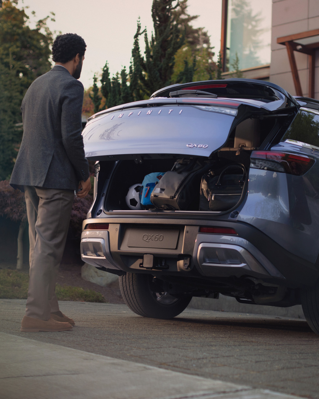 INFINITI owner opening cargo space