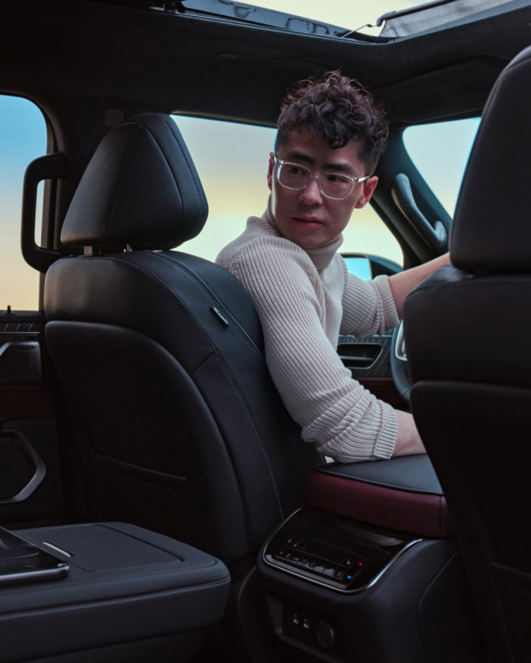 Interior view of INFINITI QX80 owner looking back