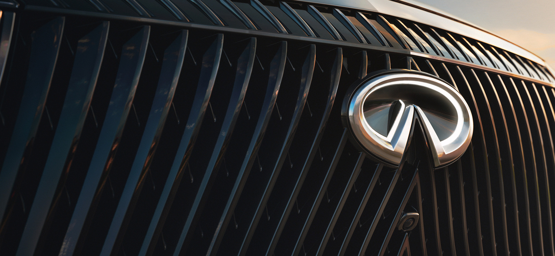 INFINITI grille close-up with logo badge