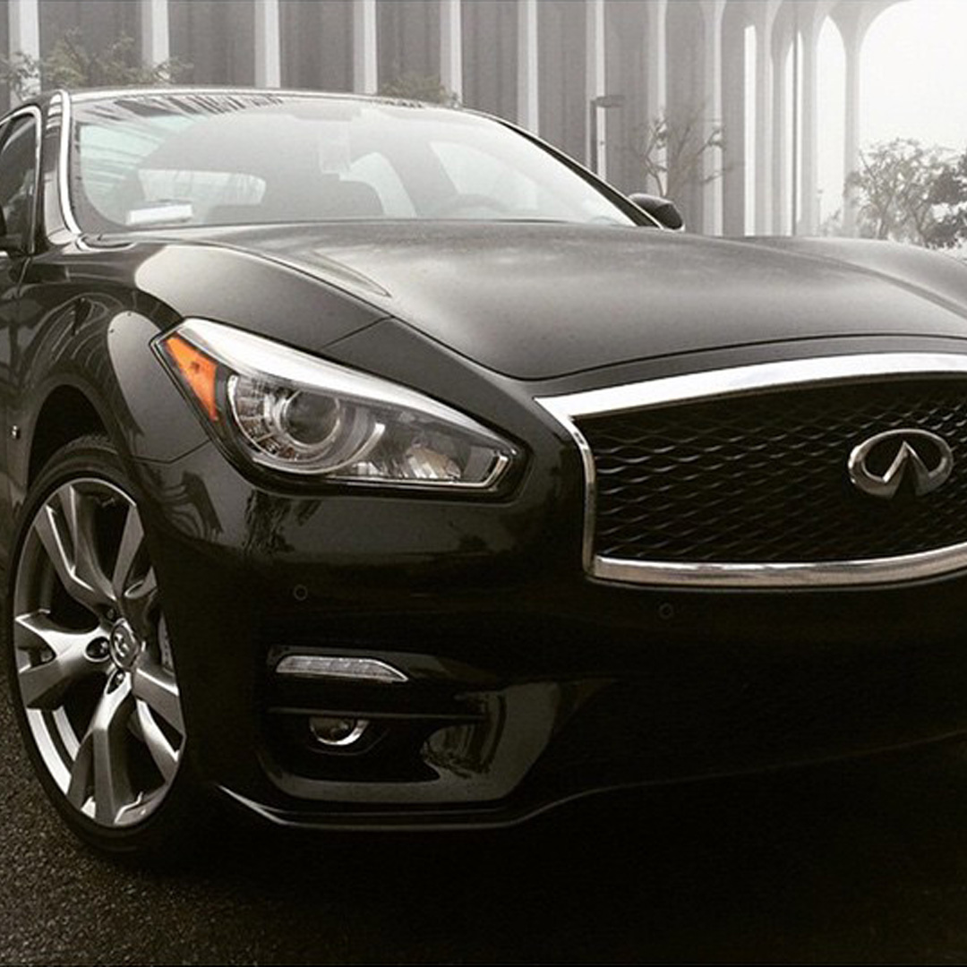 Front end of INFINITI Q70 luxury sedan in black