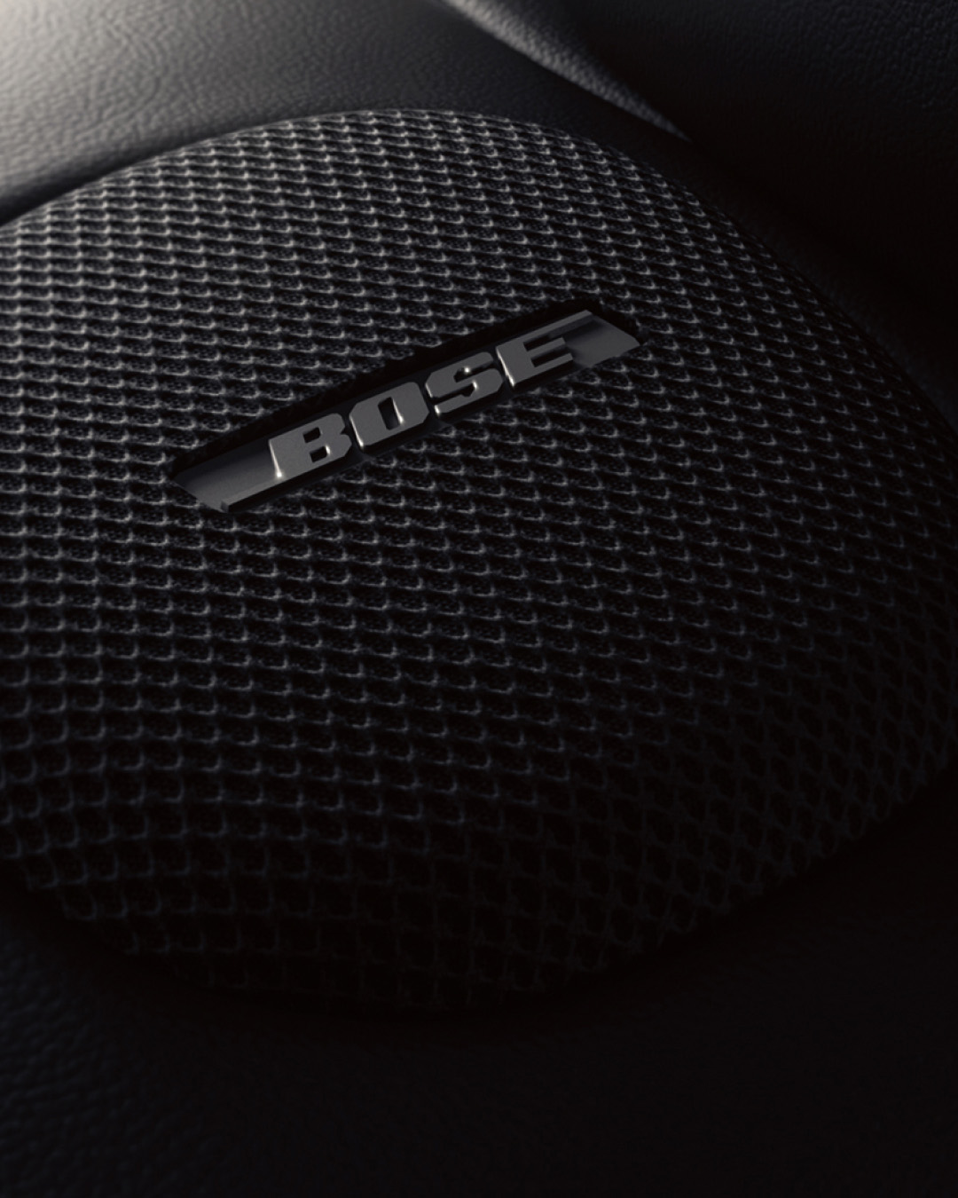 Closeup of INFINITI Q70 Luxury Sedan Bose premium speaker