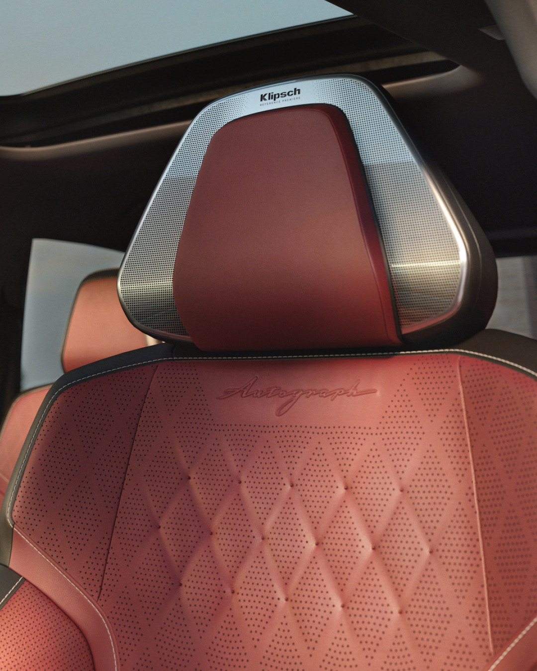 2026 INFINITI QX80 Klipsch immersive sound speaker integrated into headrest