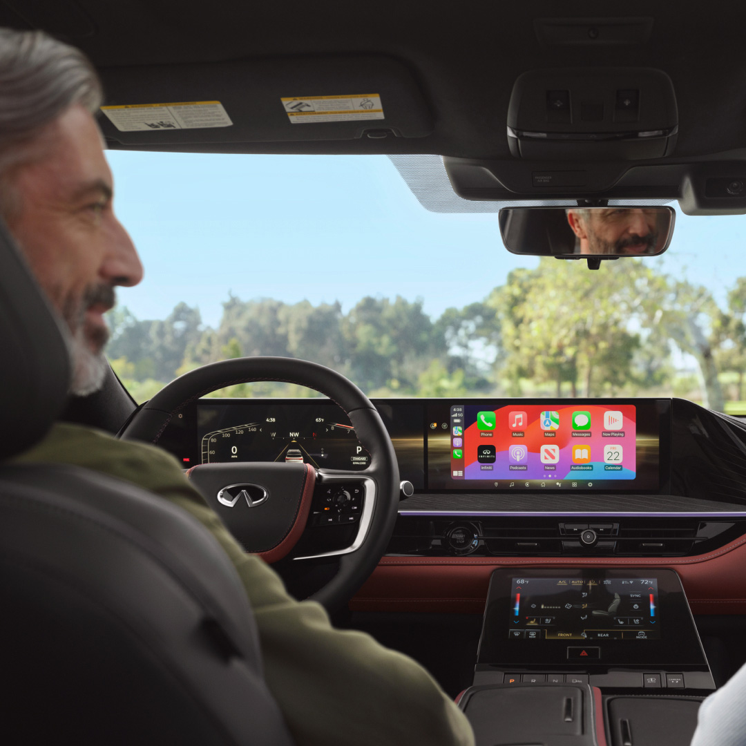 2026 INFINITI QX80 dashboard featuring Apple CarPlay and smartphone integration