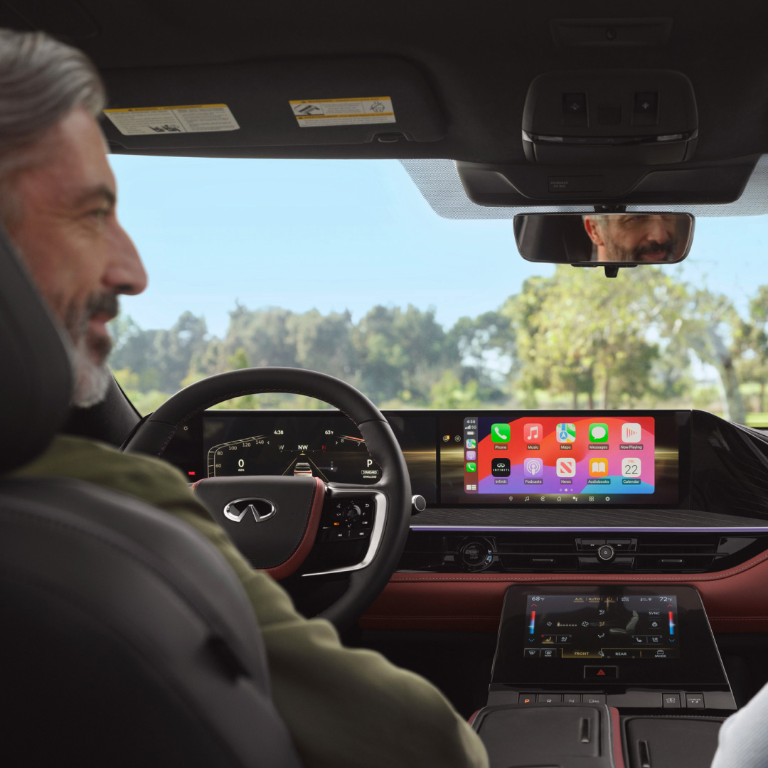 2026 INFINITI QX80 dashboard featuring Apple CarPlay and smartphone integration